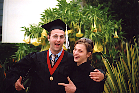 Doug and CJ clowning after the graduation ceremony