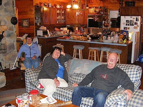 Maija, Looly and Bob            relax in front of the kitchen